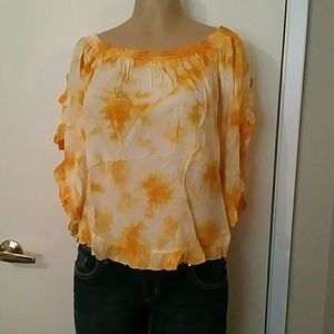 This top is truly gorgeous and it is new with tags
